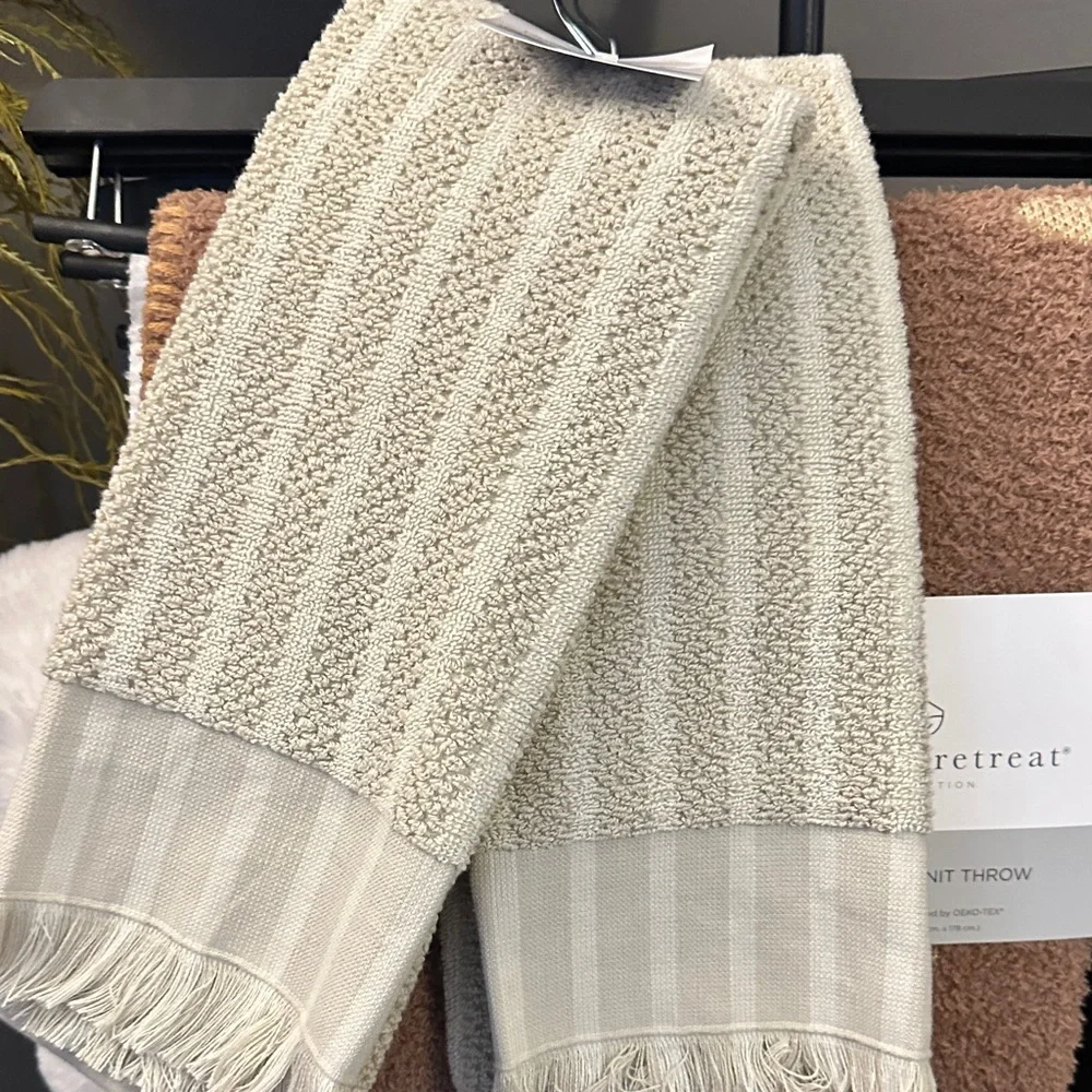Cream room and retreat two hand towels
